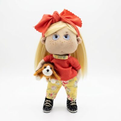 Little fabric doll Masha with a dog