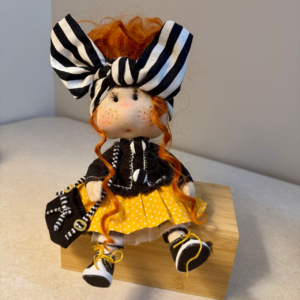 Handmade collectible doll with whimsical character design